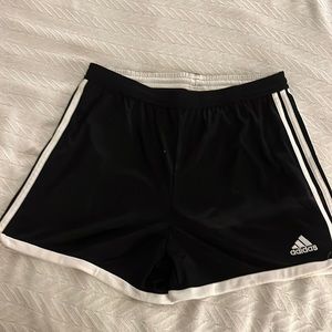 Adidas women’s black athletic shorts, size M.